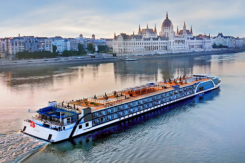 River Boat Sailing river boat sailing down a river in Budapest