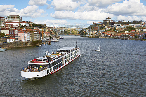 river cruise boat traveling on a river